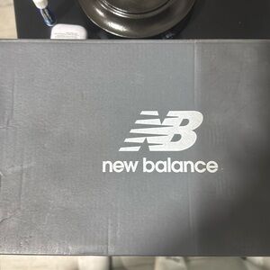 Brand new New Balance sneakers. Men’s 7.5, Women’s 9